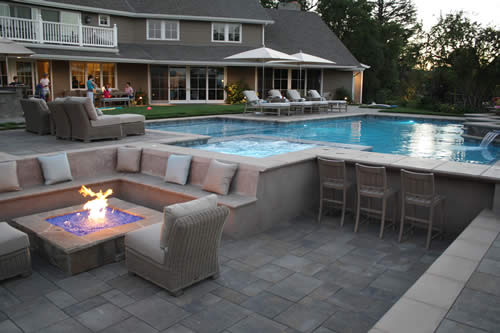 © Scott Cohen - Contemporary clean lines pool design with spa sunken patio    firepit