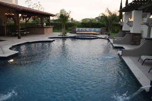© Scott Cohen - Formal curvy resort pool design 2