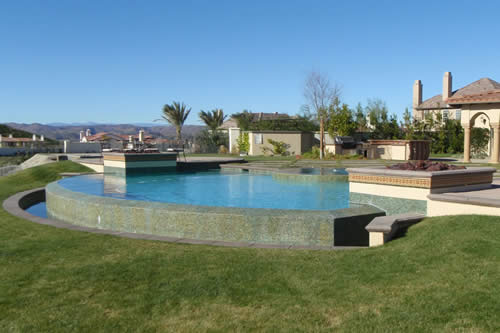 © Scott Cohen - Formal free form resort pool design with water feature 1