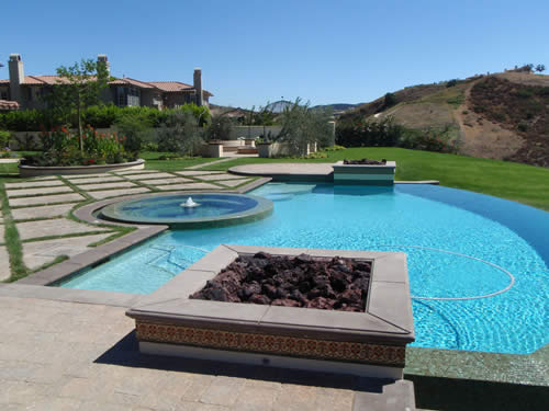 © Scott Cohen - Formal free form resort pool design with water feature 3